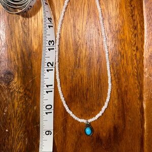Southwestern design white bead necklace with turquoise charm